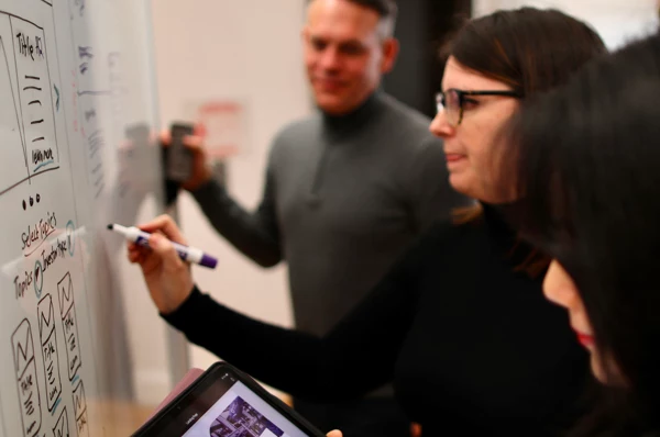 team working session strategy whiteboard